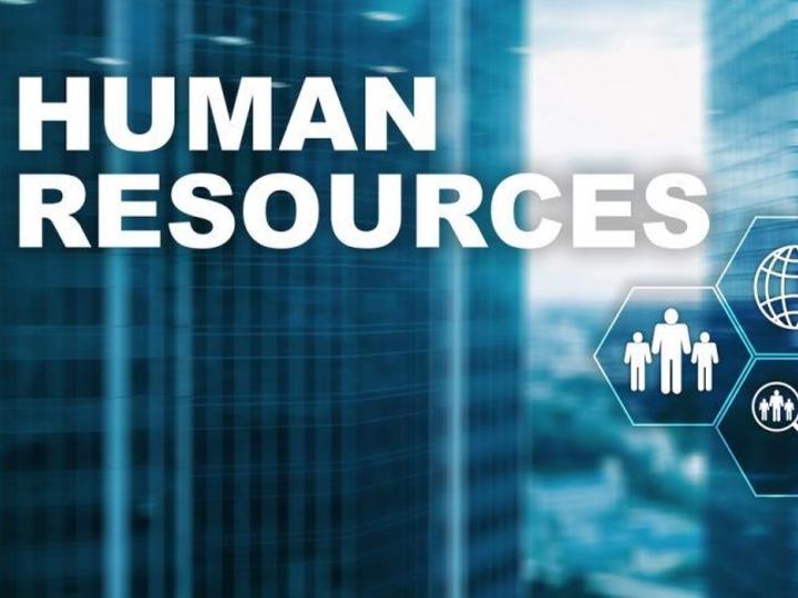 "Human Resources" in white over blue buildings in the background.