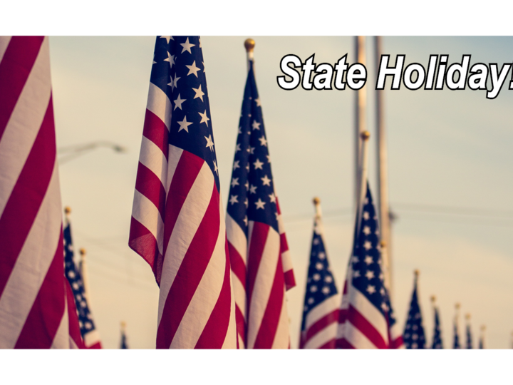 Closeup of a row of American flags with a sunset in the background. The text "State Holiday" is overlaid in the corner.