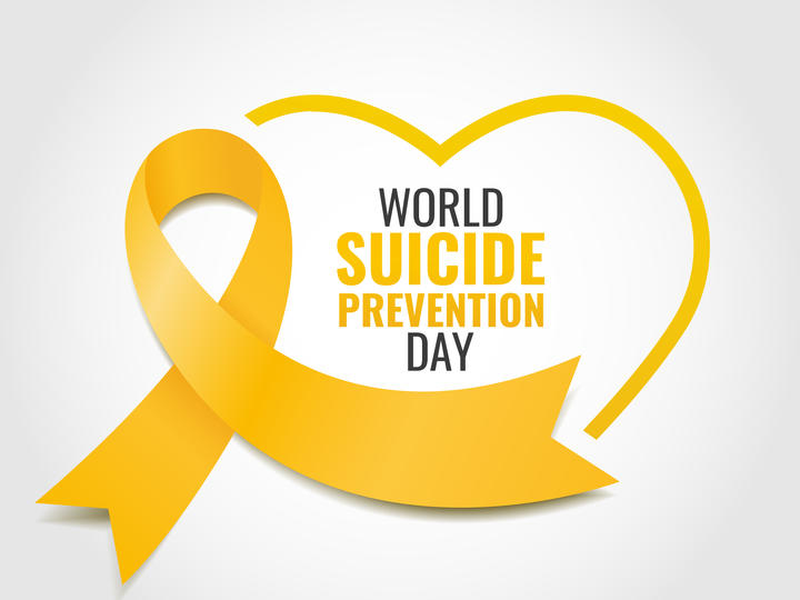 World Suicide Prevention Day yellow ribbon and text