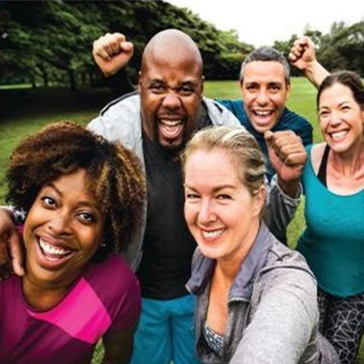 group of active people taking a selfie