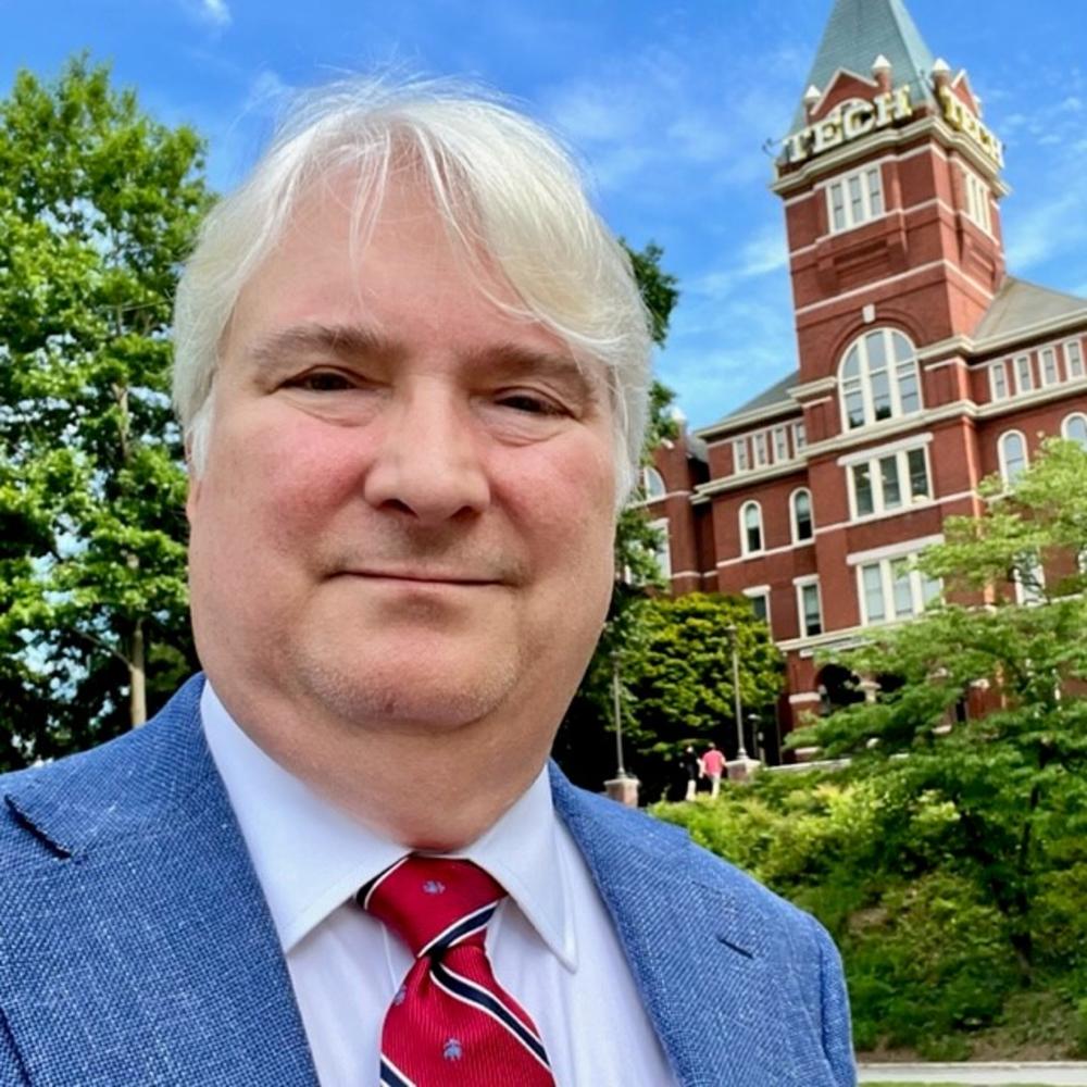 Closeup photo of Michael Waschak outside Georgia Tech tower.