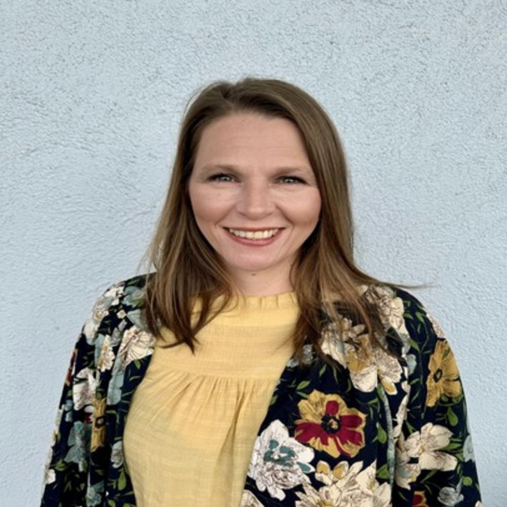 Headshot of female employee smiling 