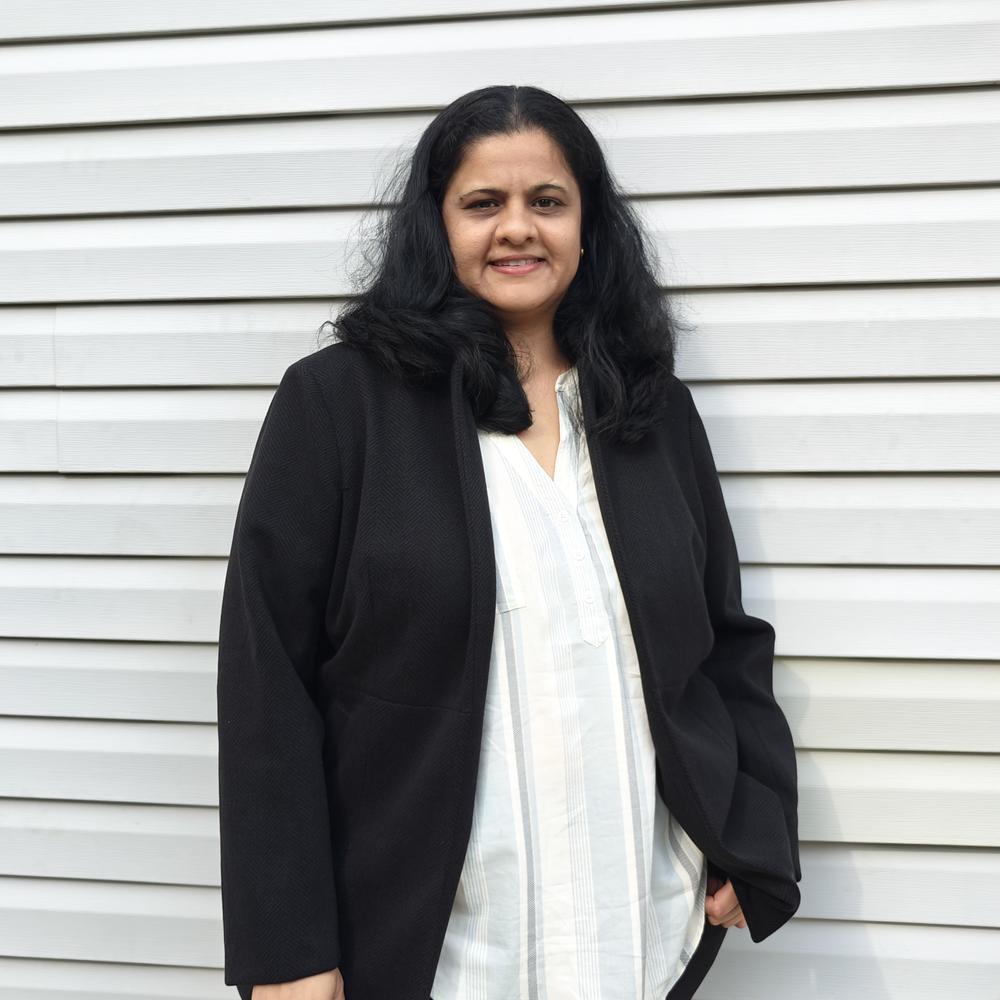 Photo of female wearing black and white