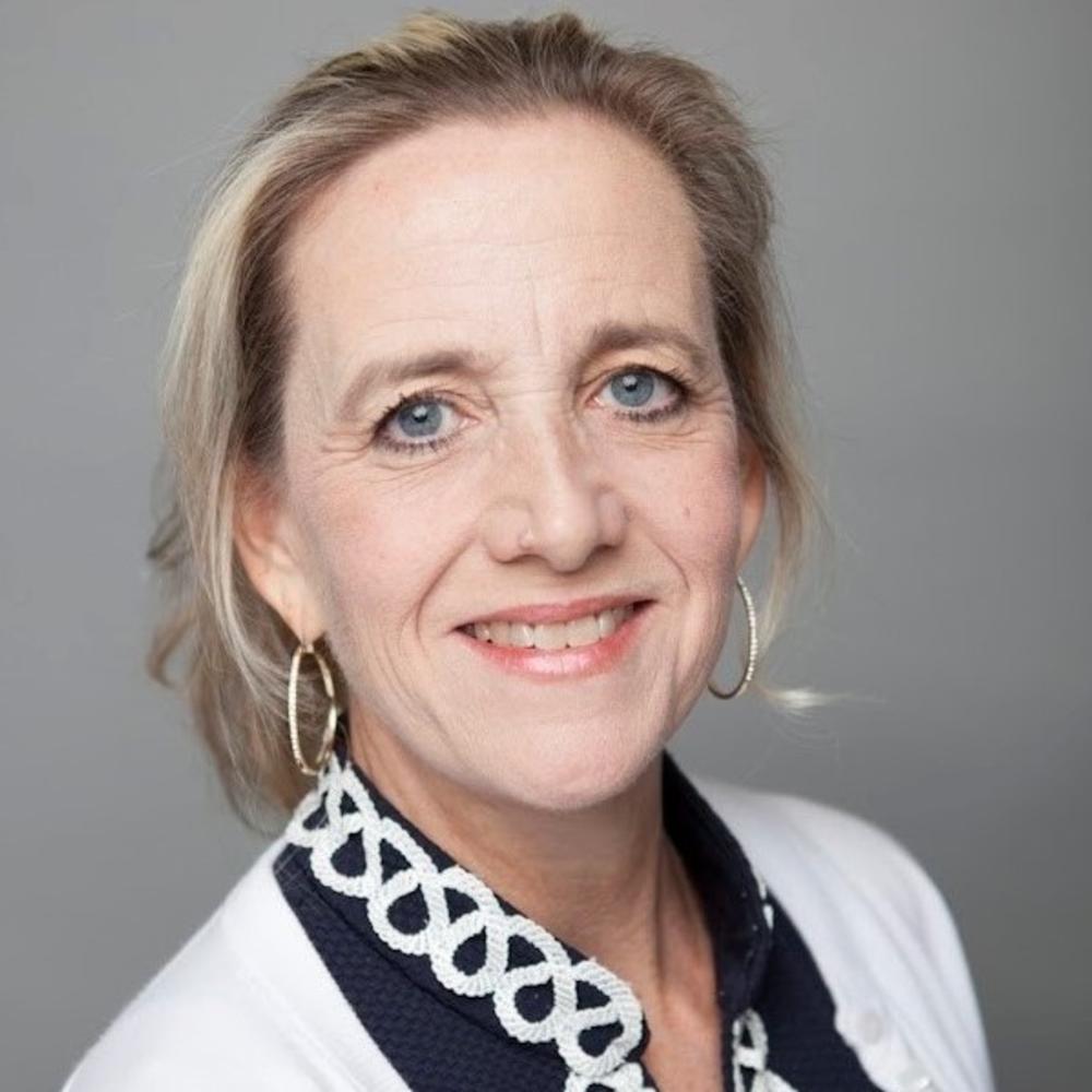 Female headshot on gray background